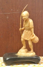 Vintage Japanese / Chinese Resin/ Bone Okimono Fisherman