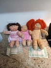 Vintage Cabbage patch dolls lot of 3. two have birth certificates.