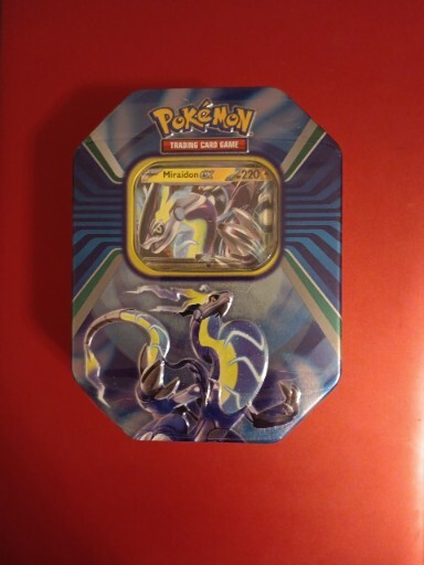 Paldea Legends Tin - Miraidon ex - Pokemon Sealed Products » Pokemon Tins &  Box Sets - Darkhound Game Center