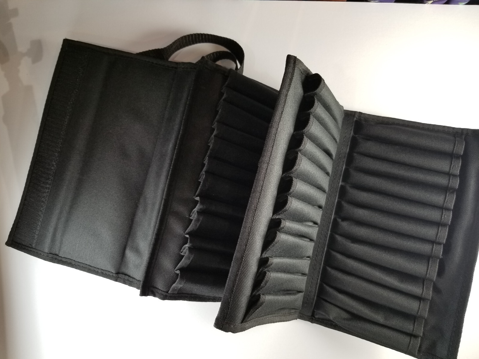 Copic Marker Case holds 72 markers in the wallet that also converts to a stand