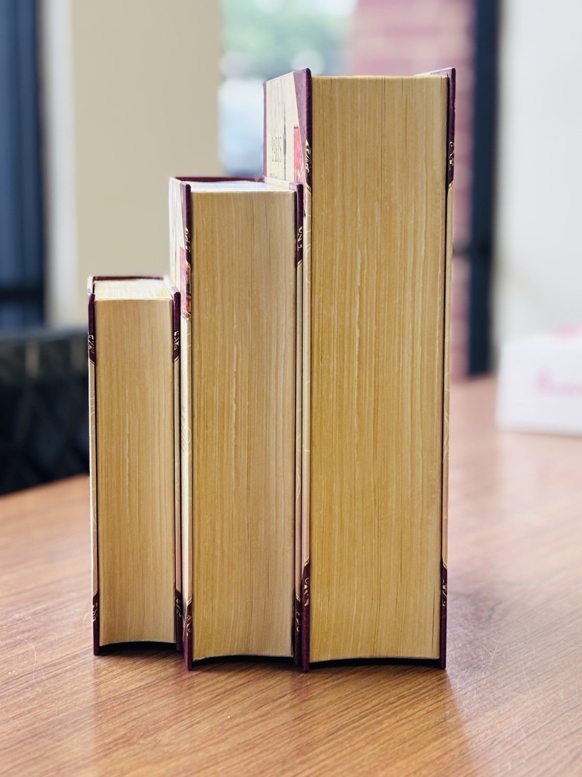 A set of decorative nesting faux storage books by Punch Studio