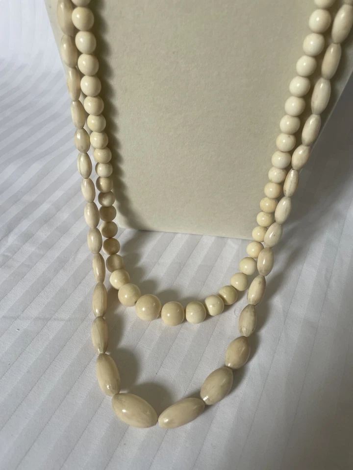 Juego de collar con cuentas de hueso Foto 3 de 4