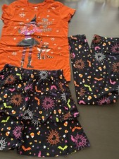3-piece Halloween-themed outfit for girls size L : blouse, skirt, and leggings.