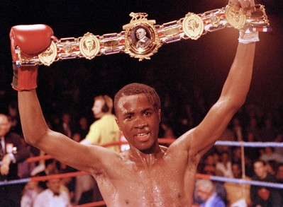 Colin McMillan of England poses with the title belt after defeatin- Old Photo