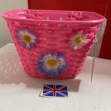 Image of Front Junior Bike Basket Woven 10" Plastic with Flower & straps (Metal Braced).