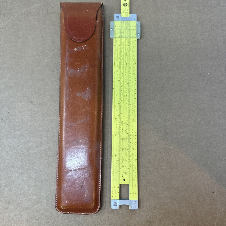 A Pickett N-500 ES slide rule with original leather case — the 'ES' (Enhanced Scale) model was a cut above standard rules, made right in the USA.