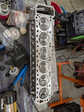 Datsun L26 Head, Manifolds, and accessories.