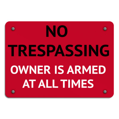 Horizontal Metal Sign No Trespassing Owner Is Armed at All Times Security