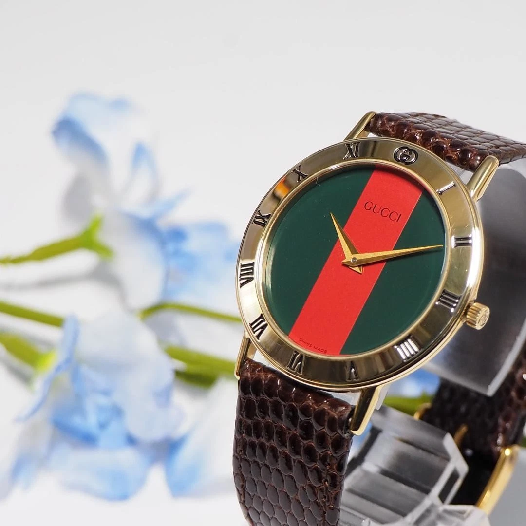 Montre homme Gucci Sherry Line ceinture cuir romain F423