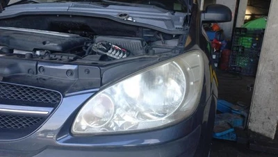 Optique avant principal gauche (feux)(phare) HYUNDAI GETZ PHASE 2 921011C500 - Photo 1/4