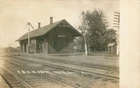 Real Photo Postcard C & N Railroad Depot, Malta, Illinois - used 1909