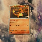 Charmander 011/094 NM Cosmos Holo - Prize Pack Series 9 - Play! Pokemon Stamped