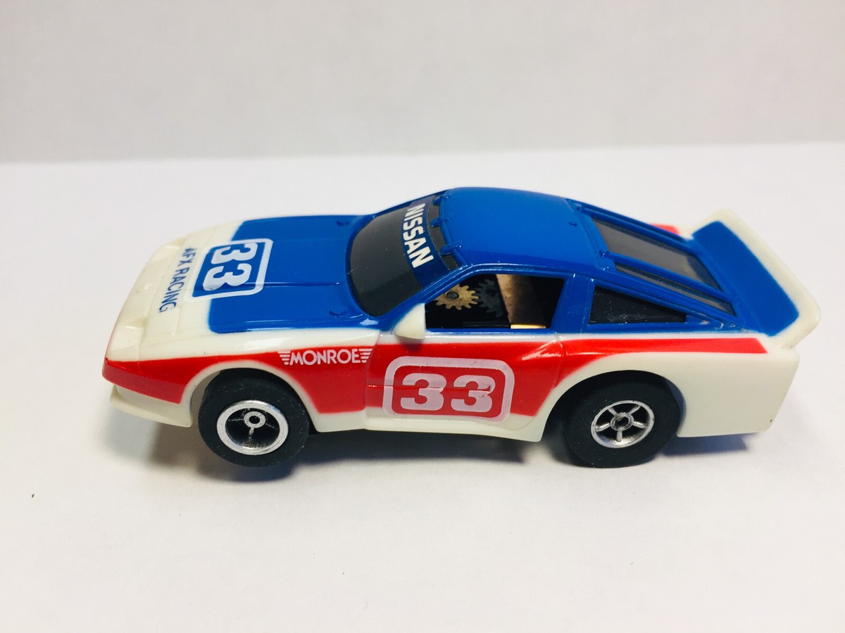 AFX / TOMY 300 ZX #33 ( LT BL VERSION ) & AW chassis ~ BRAND NEW