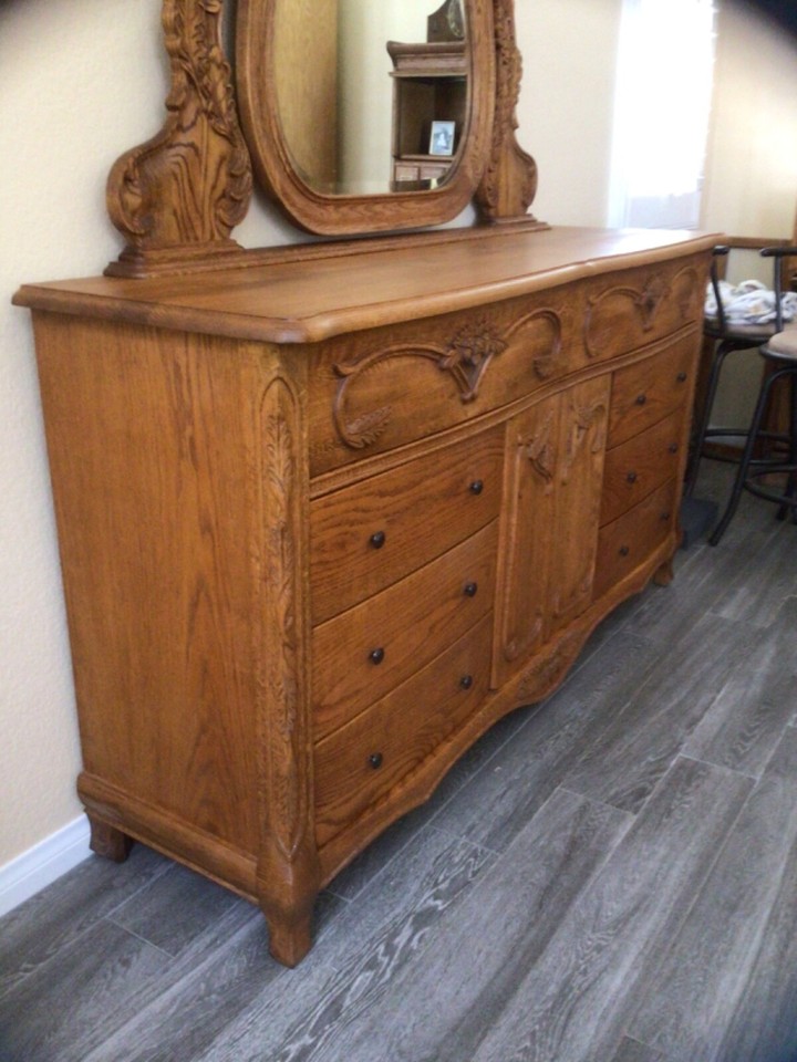 OAKWOOD INTERIORS 10 DRAWER DRESSER WITH BEVELED GLASS MIRROR