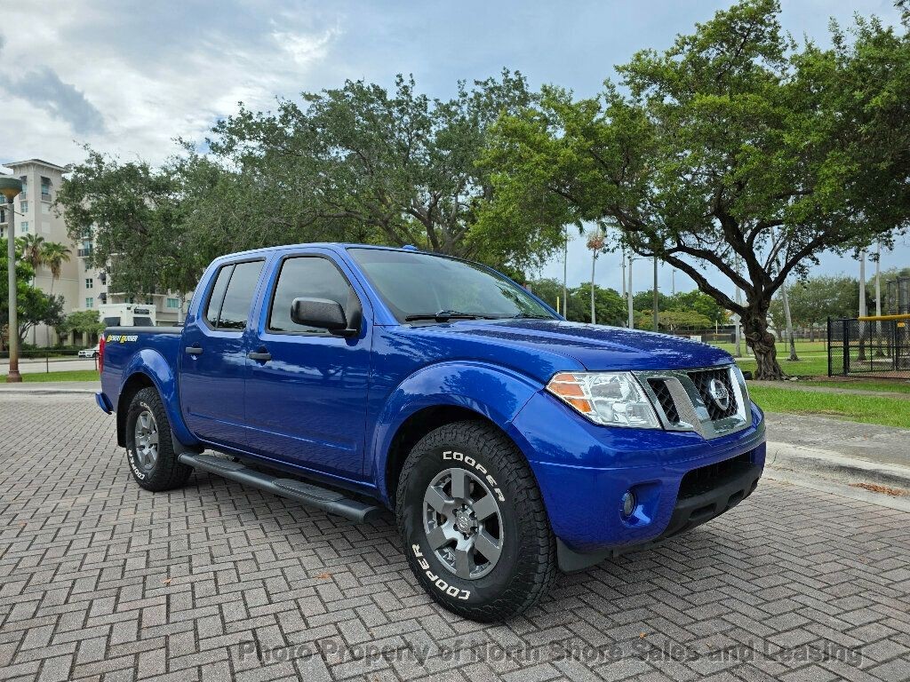 Image of 2013 Nissan Frontier 2WD Crew Cab SWB Automatic Desert Runner