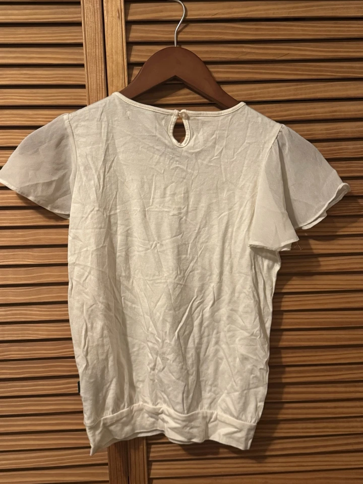 Camisa de vestir de manga corta DKNY para niñas color negro crema lentejuelas encaje cuello Peter Pan; M Foto 2 de 4