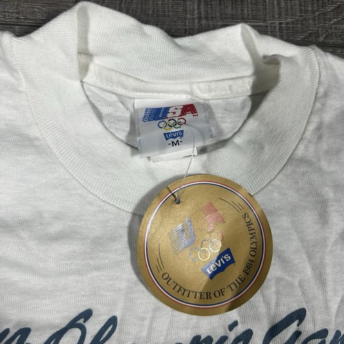 VTG 1984 Olympic Games Levi’s T-Shirt Deadstock USA High Jump M Made in USA NOS - Picture 2 of 8
