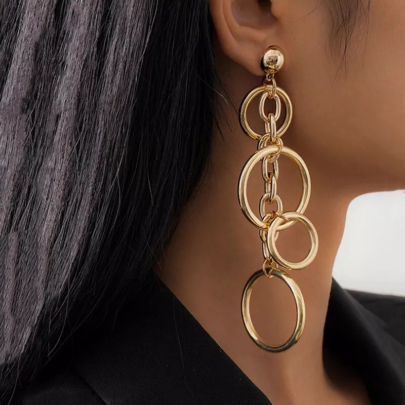 Big gold hotsell earrings hip hop