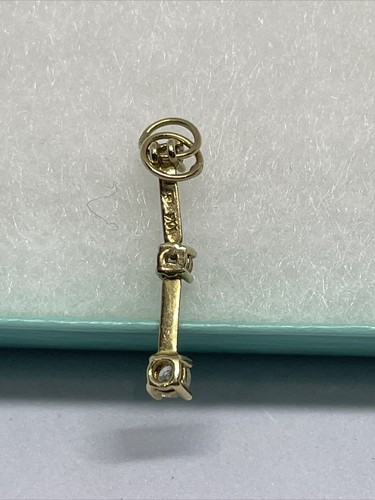 Pendentif charme vertical mobile or jaune 10 carats princesse diamant 3 pierres - Photo 8/13