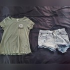 girl 14 Lucky Brand denim shorts and green ribbed tee