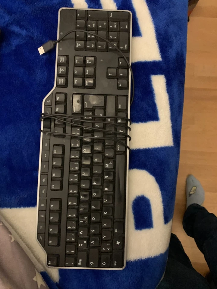 White Apple Mouse and Black with Silver Trim Keyboard Set