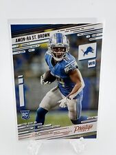 2021 Panini Chronicles Amon Ra St. Brown Prestige Rookie Card #234 Lions