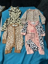 4 Gently Used Baby Girl One Piece Outfits Size NB Multiple Brands