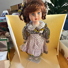 Brown Curly Hair Blue Eyes Porcelain ceramic Girl Doll 1990s