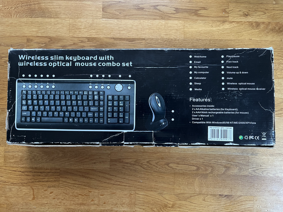 Black QWERTY Trust Wireless Keyboard & Mouse Set with Mouse Docking