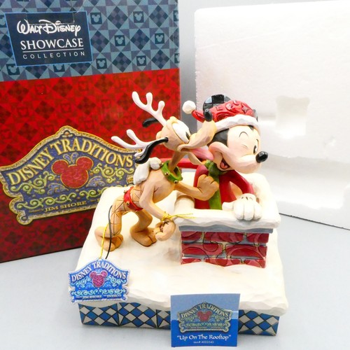 Estatuilla Enesco Disney Showcase 4023543 en la azotea en caja con etiquetas