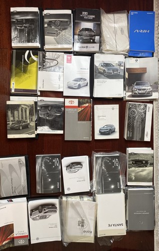 LOT OF 25 CAR OWNERS MANUALS RESALE BOOKS TOYOTA FORD JEEP NISSAN AUDI CHEVY ✅