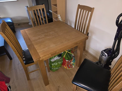 Dining Table and Four Chairs, Used but in good condition, Extendable, Solid Wood