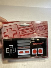 NINTENDO BELT BUCKLE-CHANGES COLLECTION 2009 RETRO GAMING IN PACKAGE