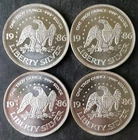 Lot of Four 1986 A-Mark 1oz Silver Liberty Rounds