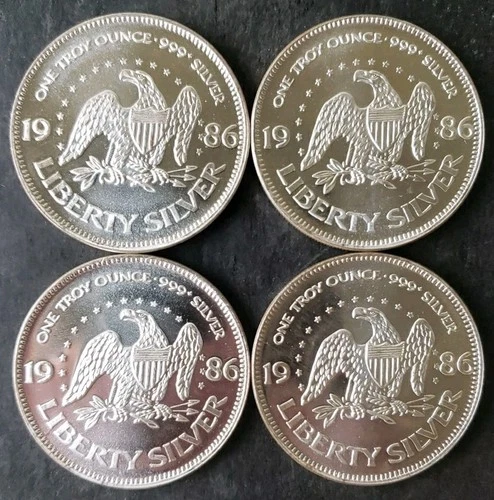 Lot of Four 1986 A-Mark 1oz Silver Liberty Rounds