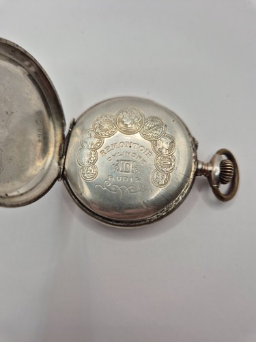 Petite montre de pochet à gousset en argent ciselé 0,800 10 rubis fin XIXème - Bild 8 von 11