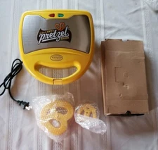 Nostalgia Electrics Stainless Steel 2in1 Electric Soft Pretzel Maker ,New no box