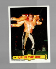 1985 Topps WWF  BRUTUS BEEFCAKE "Up In The Air!" Wrestling card #26 Excellent