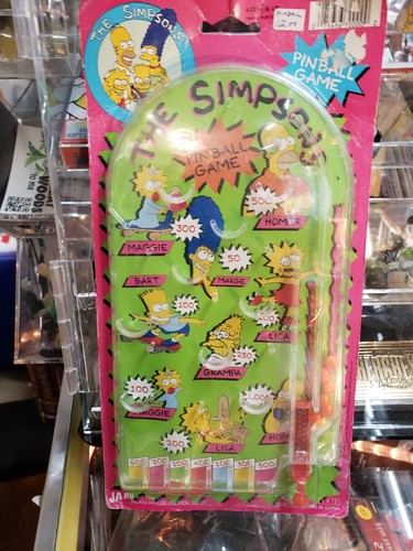 The Simpsons Handheld Pinball Game # 198 1990 Vintage. Cardboard A Bit Wavy 