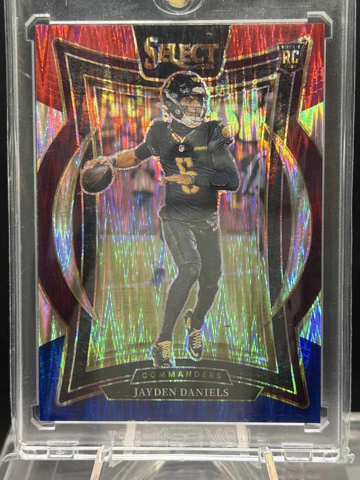Jayden Daniels 2024 Panini Select Red & Blue Prizm Shock #26 RC Commanders