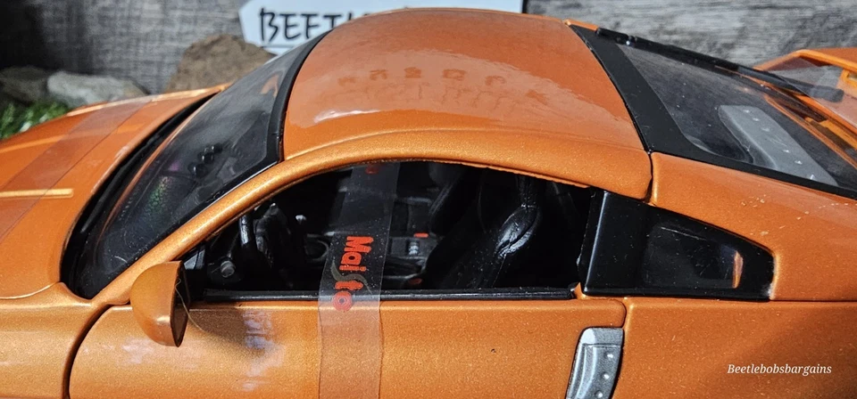 Coche diecast Nissan 350Z Nismo S-Tune 2004 edición especial Maisto 1:18 de colección Foto 3 de 4