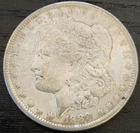 1889 Morgan Silver Dollar - no mint mark (VF to EF condition)
