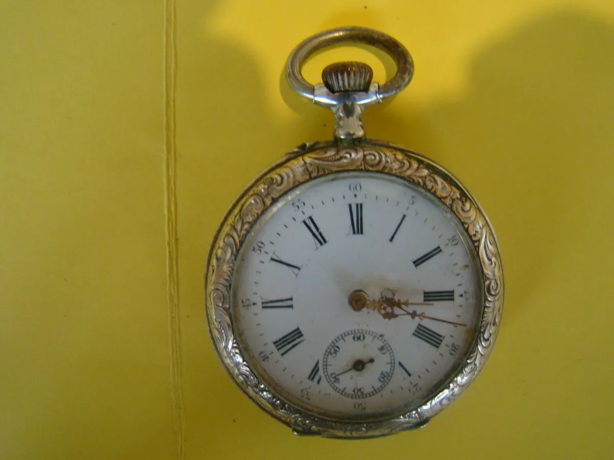 Montre gousset cylindre huit rubis argent sale