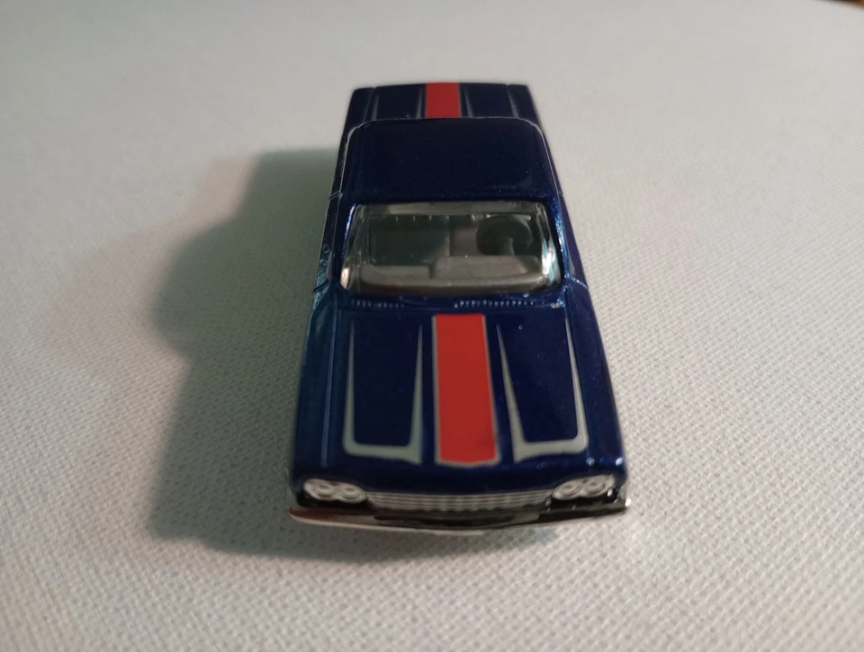 Chevy Impala 2012 Hotwheels Muscle Mania GM '62 azul 5 velocidades ruedas cromadas  Foto 3 de 4
