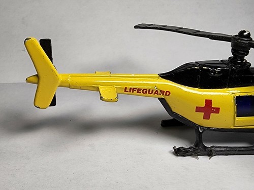 Helicóptero helicóptero de rescate de emergencia amarillo del departamento de playa salvavidas sin marca - Imagen 4 de 10