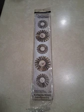 Sizzix Sizzlits Decorative Strip Die, the "Mini Paper Rosettes" Tim Holtz.