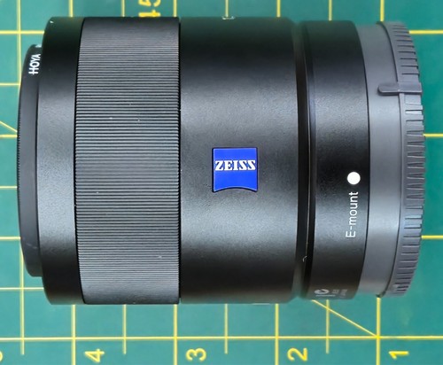 Mint Sony 24 mm Zeiss F1.8 E-mount Wide Angle Lens with UV filter, hood, and bag - Picture 3 of 12