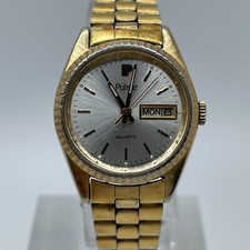 Pulsar Womens Watch Day Date Quartz Analog Y643-0010 Three Hands Gold Tone