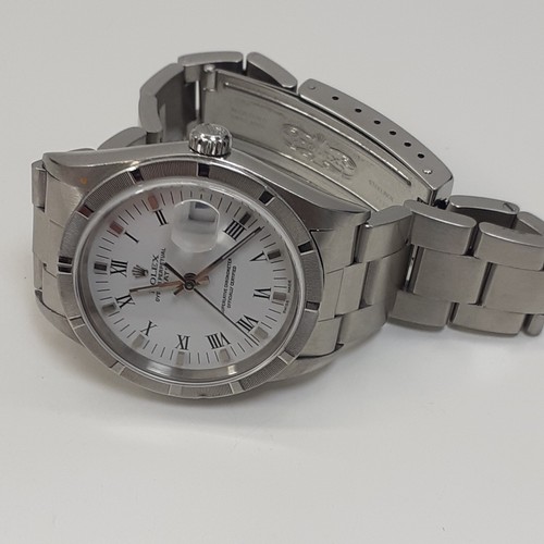 Rolex Date 34 mm Steel White Roman Automatic Oyster Watch 15210 F Series 2004 - Picture 4 of 11