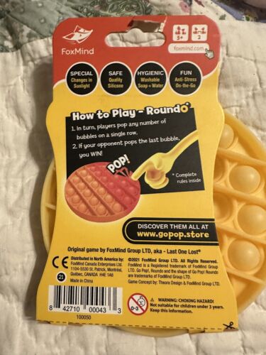 Foxmind Go Pop Special Edition Round UV Yellow Pooping Game - Picture 2 of 2